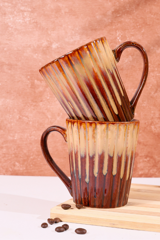 Two brown coffee mugs 