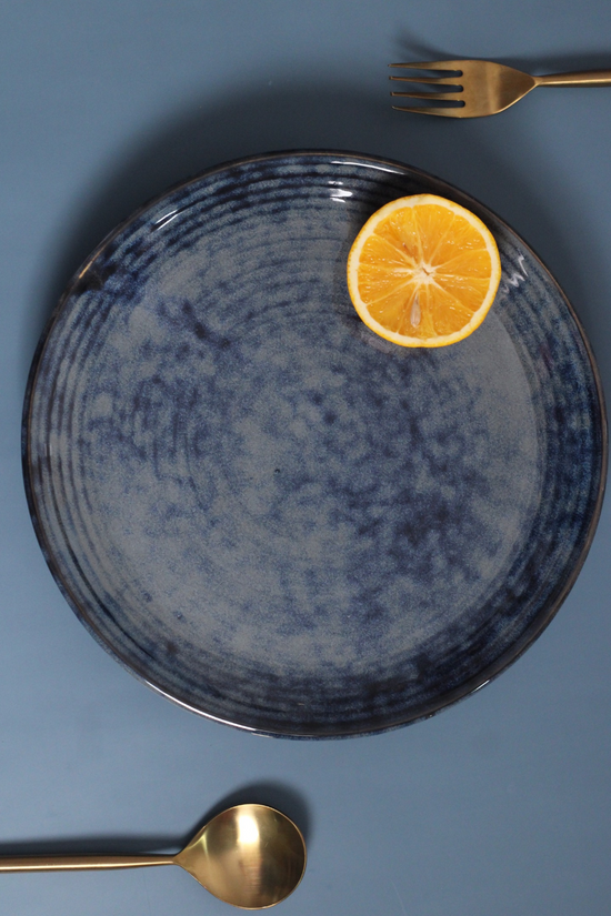 Grey spiral dinner plate with cutleries 