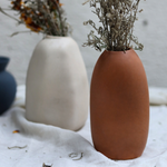 Rust flower pots with plant
