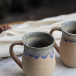 Brown and blue drip coffee mug tall