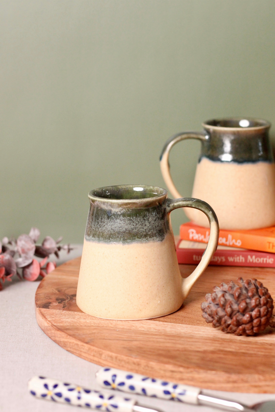 Cream and green ceramic coffee mug 