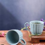 Two sky blue chai cups