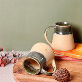 Coffee mug laying on surface