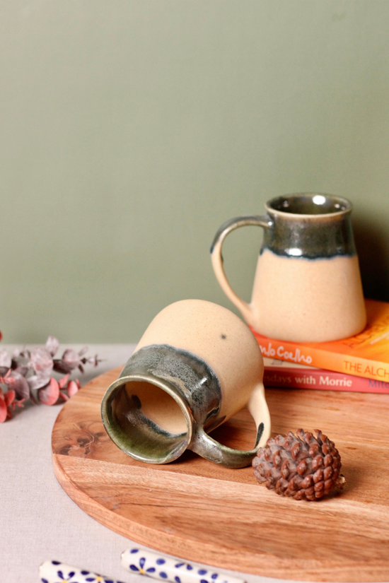 Coffee mug laying on surface
