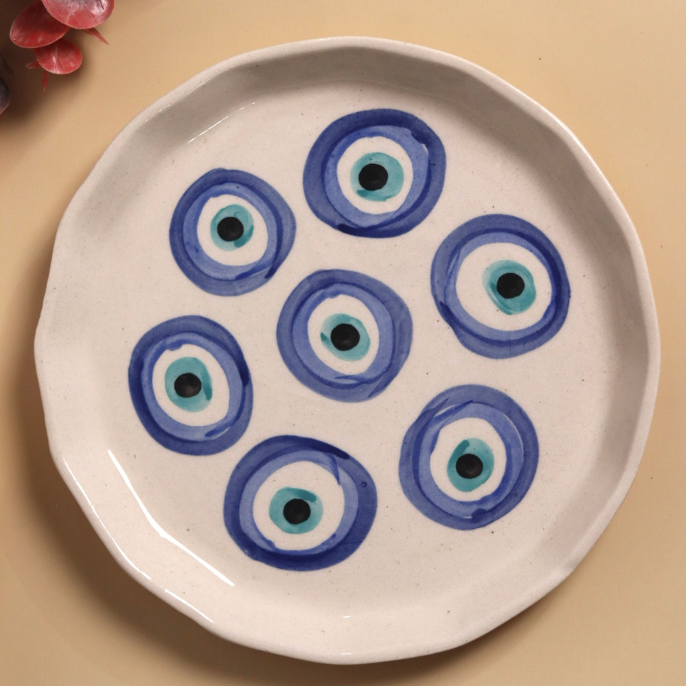 Plate having a evil eye design