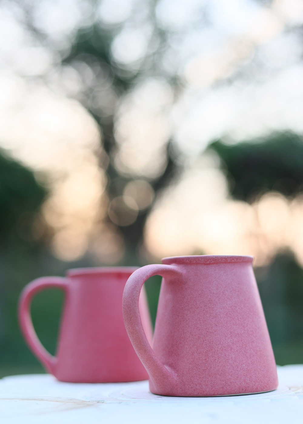 Handmade two pink ceramic coffee mugs 