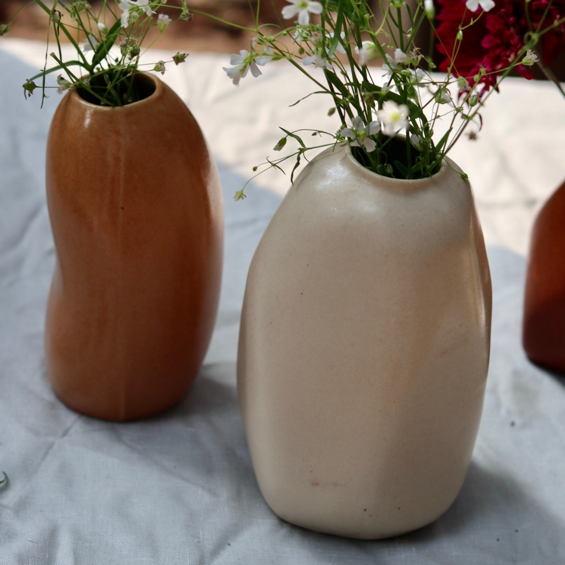 Mistif rust vases with flowers
