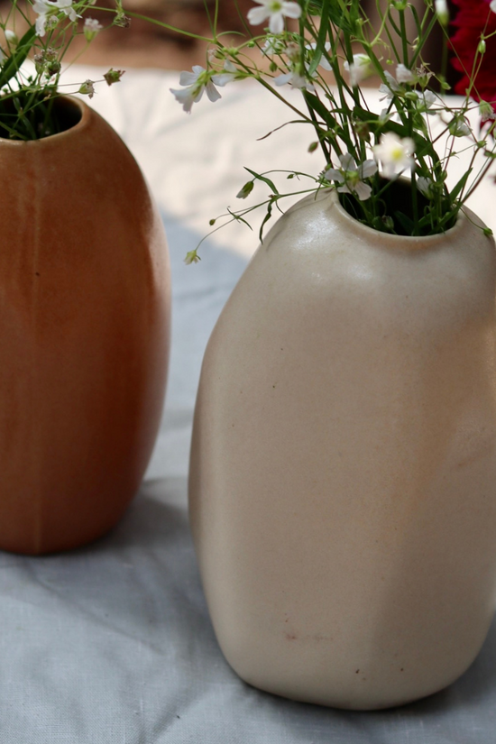Mistif rust vases with flowers