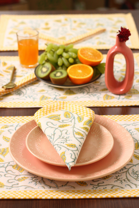 Handprinted cotton yellow bail table mat & napkin