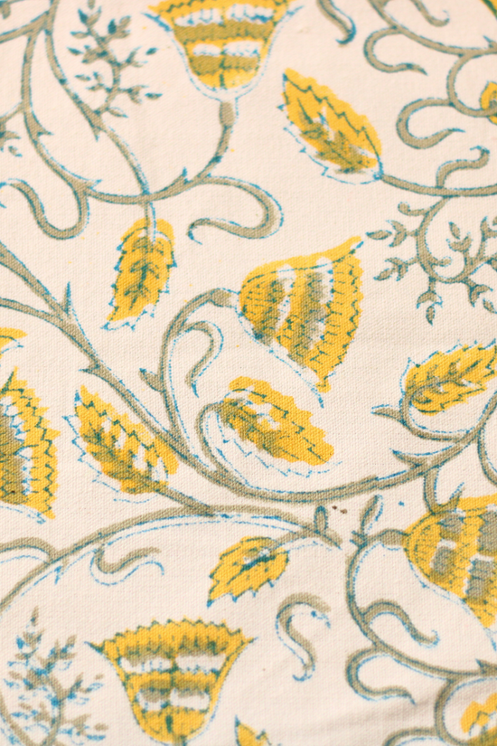 Closeup shot of yellow bail table mat & napkin