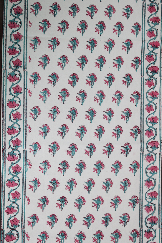 Closeup shot of pink motif table runner 