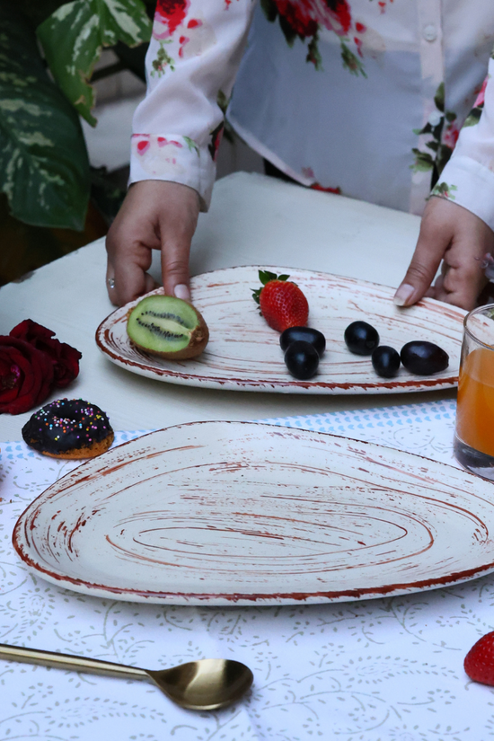 Two snack platters with fruits 