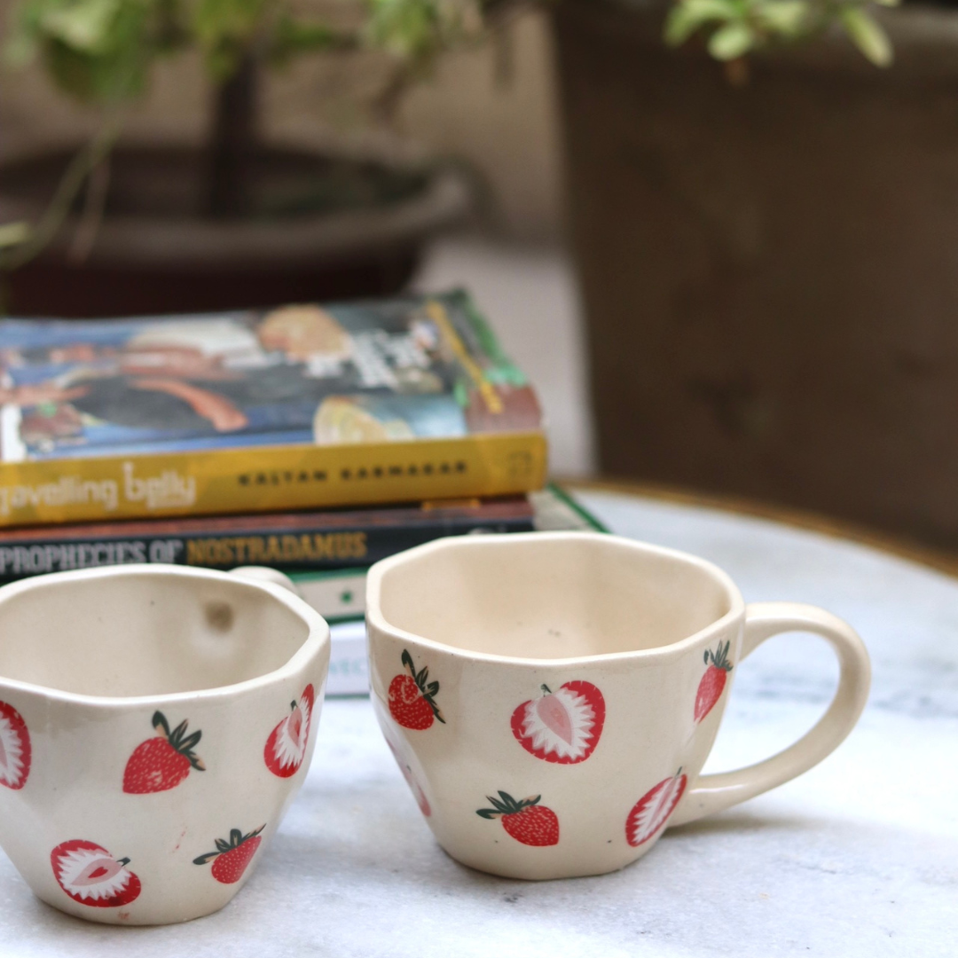 Two handmade ceramic coffee mugs 