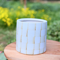 Blue checks planter on a wooden surface