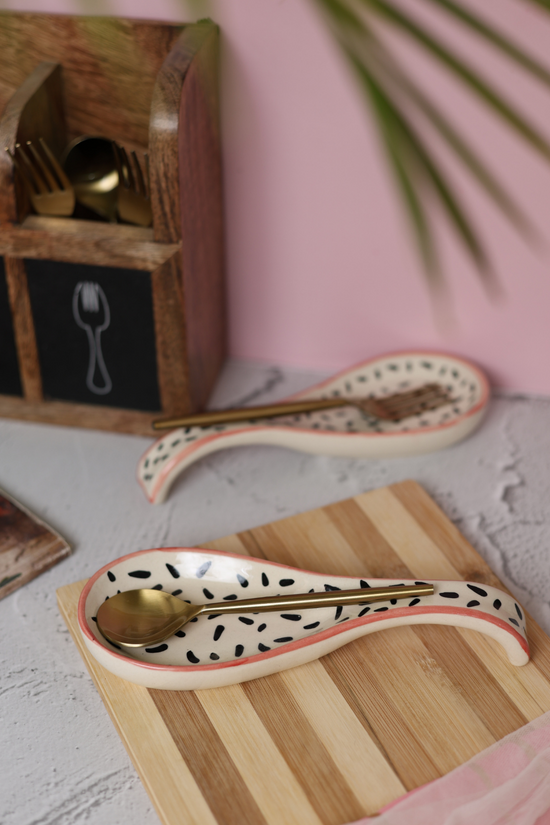 Ceramic spoon with golden spoon
