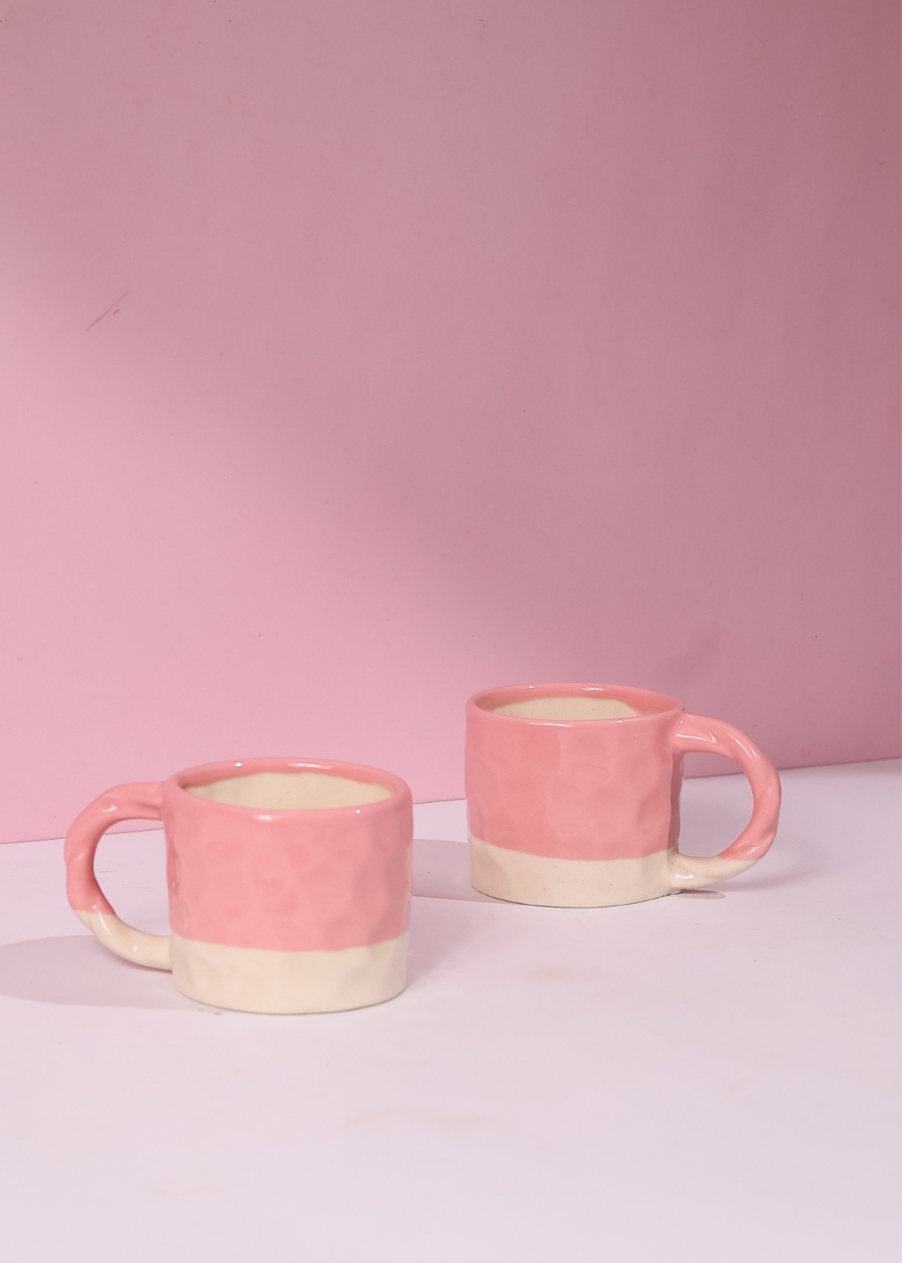White & pink coffee mugs 