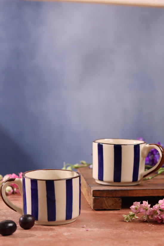 Ceramic chai cup on a wooden surface