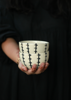 Crosses soup bowl in hand