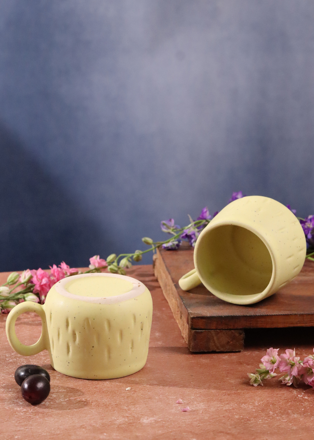 Two mellow yellow chai cups