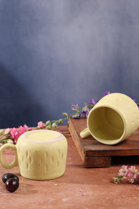 Two mellow yellow chai cups