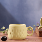 Closeup shot of mellow yellow coffee mug