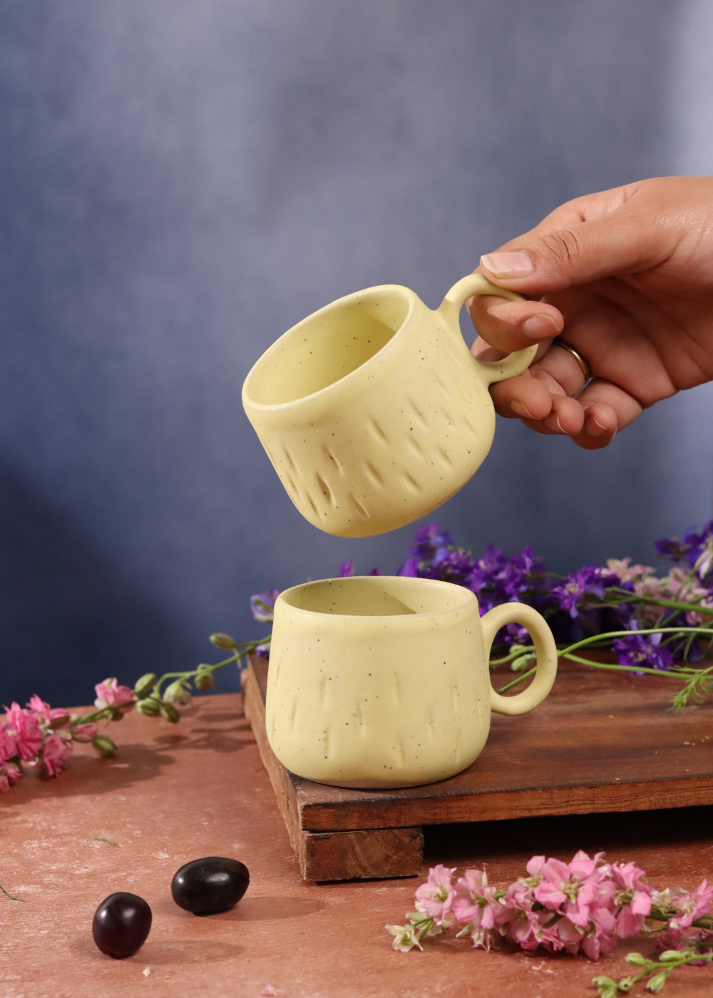 Two mellow yellow coffee mug