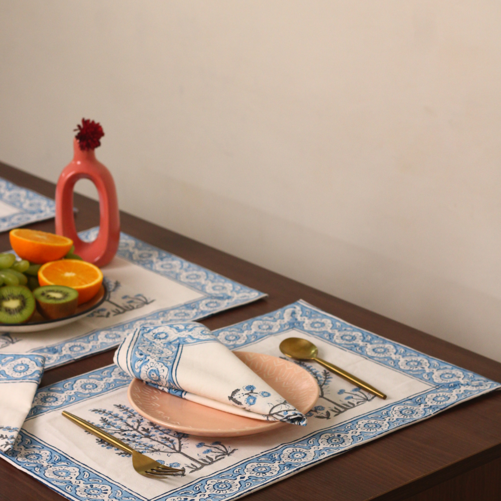 Blue tree table napkin with vase and fruits