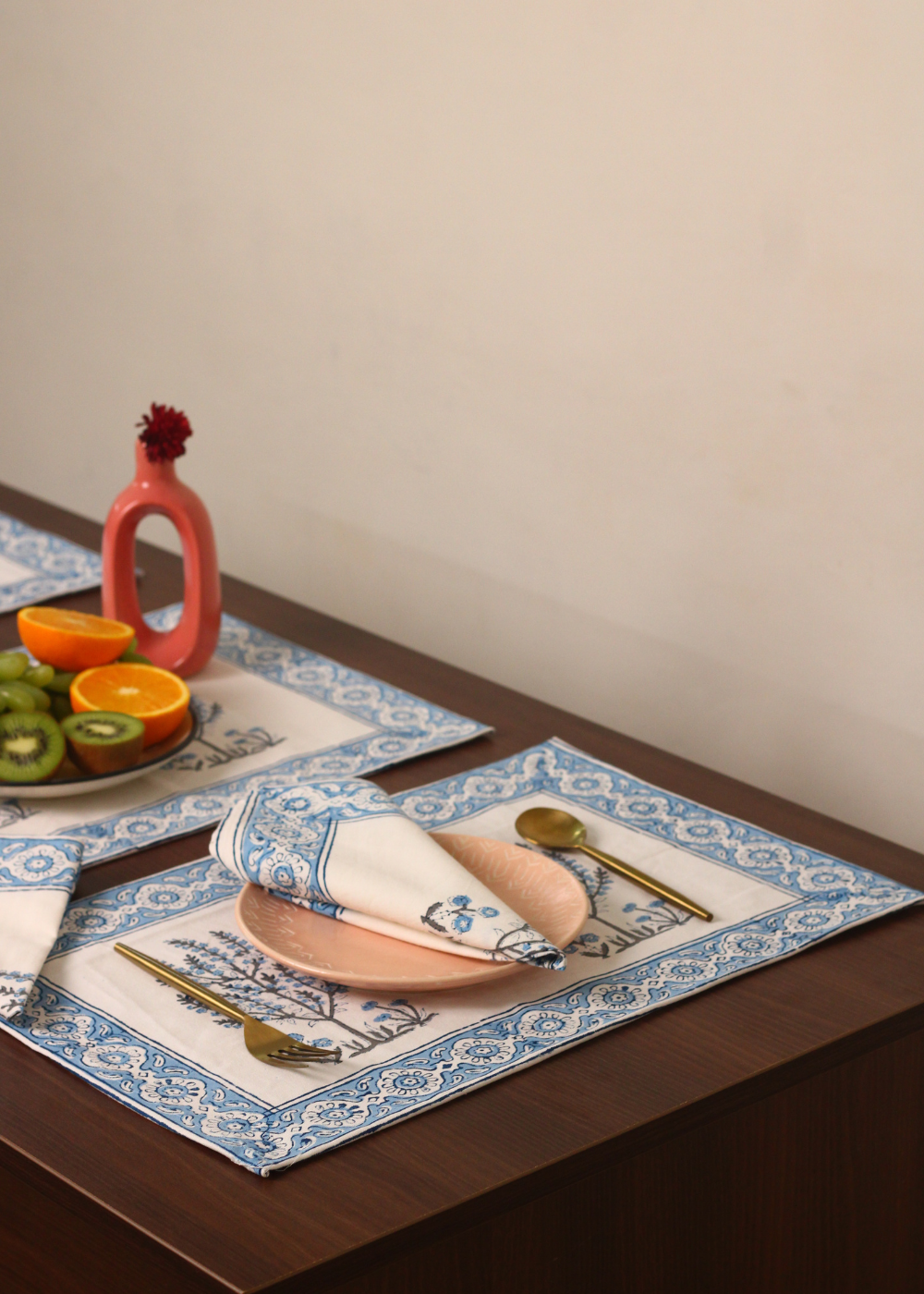 Blue tree table napkin with vase and fruits