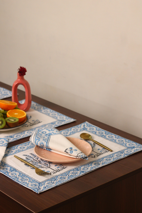 Blue tree table napkin with vase and fruits