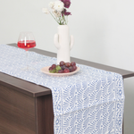Blue chevron table runner with vase 