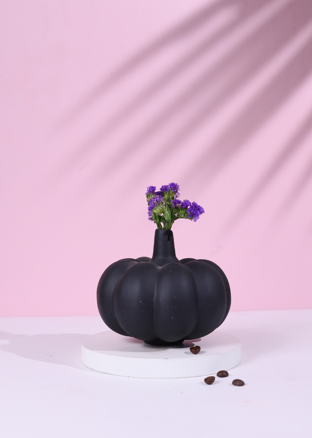 Black pumpkin bud vase with lavender flower