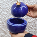 Anar jar royal blue in a hand