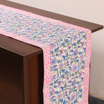 Blue floral table runner on a table