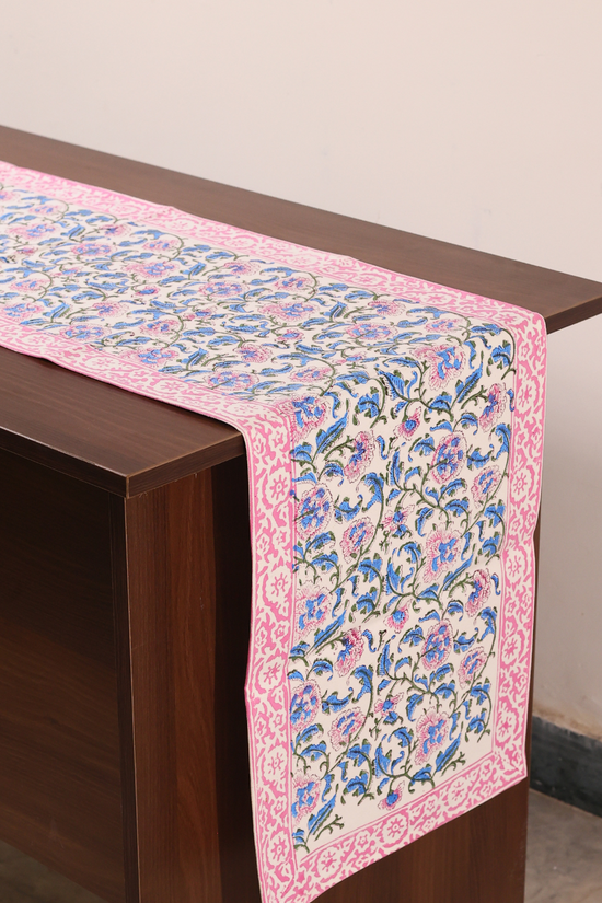 Blue floral table runner on a table