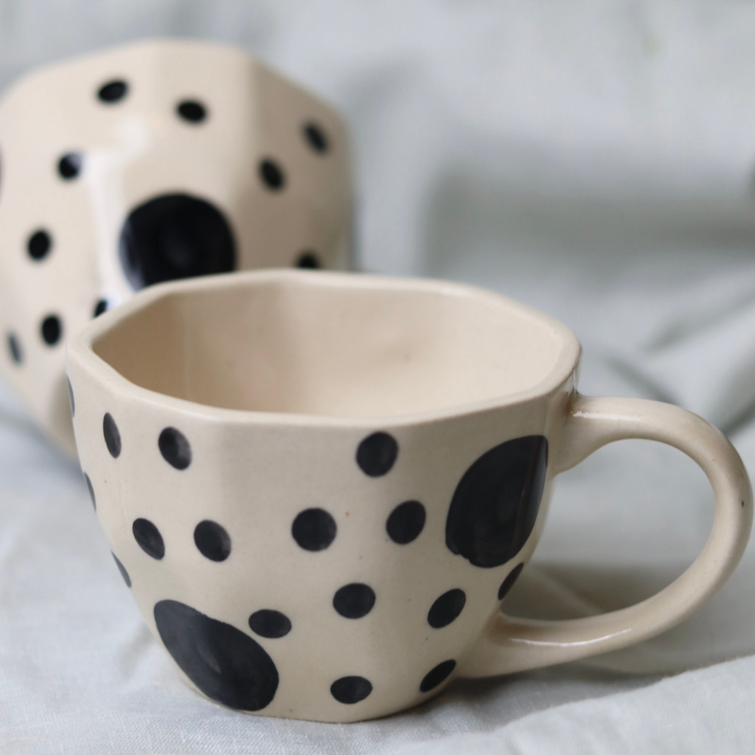 Black polka mug closeup shot