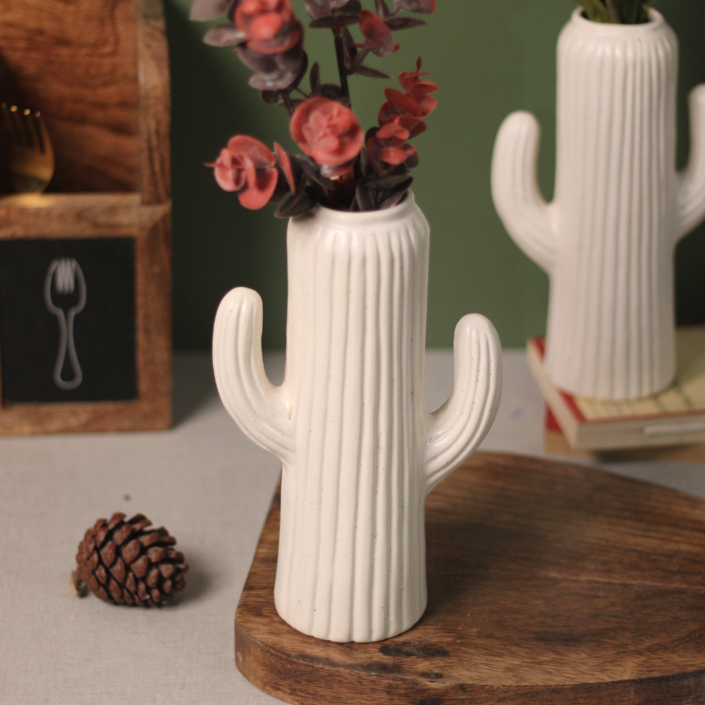 Decorative handmade ceramic white flower vase with flowers