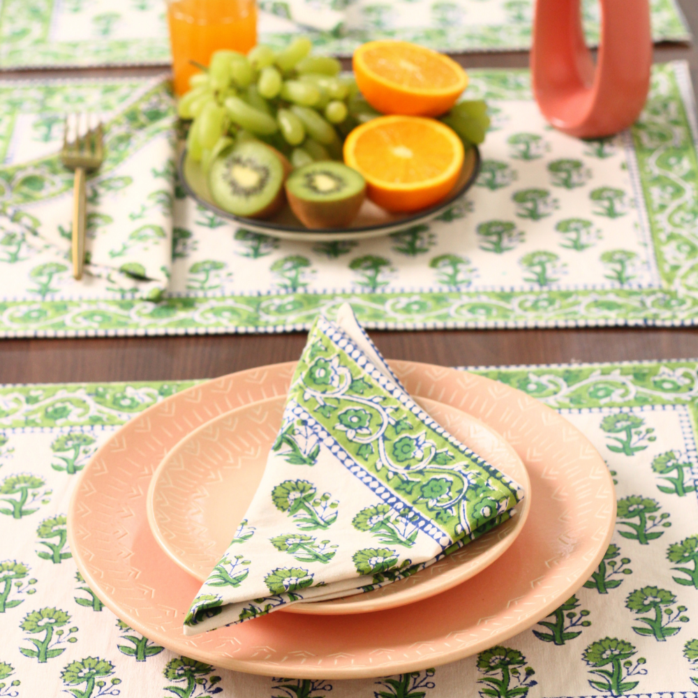 Green floral table mat & napkin on table 