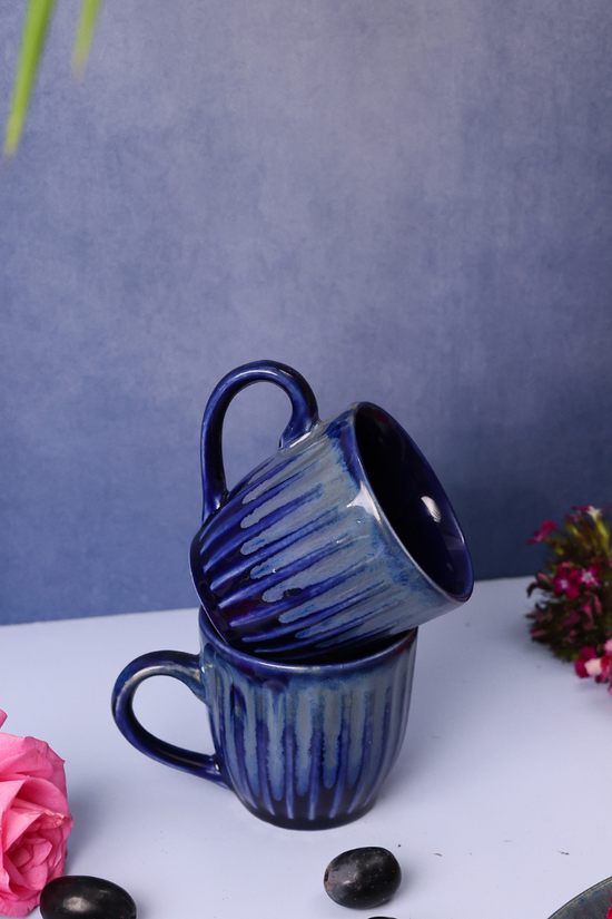Two ceramic tea cups 