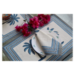 Blue palm table mat & napkin with flowers