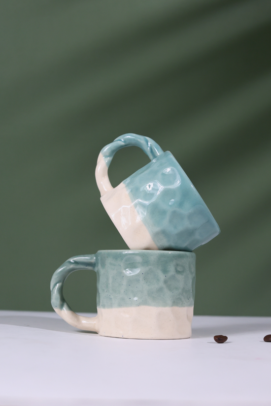 Two Ceramic Teal Handmoulded Mugs
