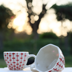 Two handmade ceramic mugs 
