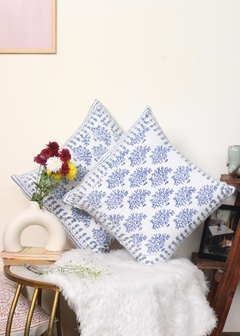 Blue banyan tree cushion cover on a chair