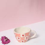 Chequered heart coffee mug with flower