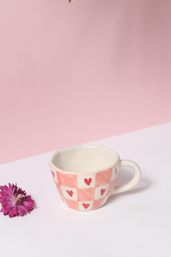 Chequered heart coffee mug with flower