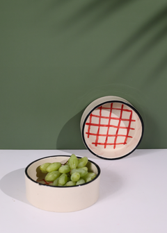 Red checks breakfast bowl with grapes