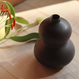 Closeup shot of black moulded vase