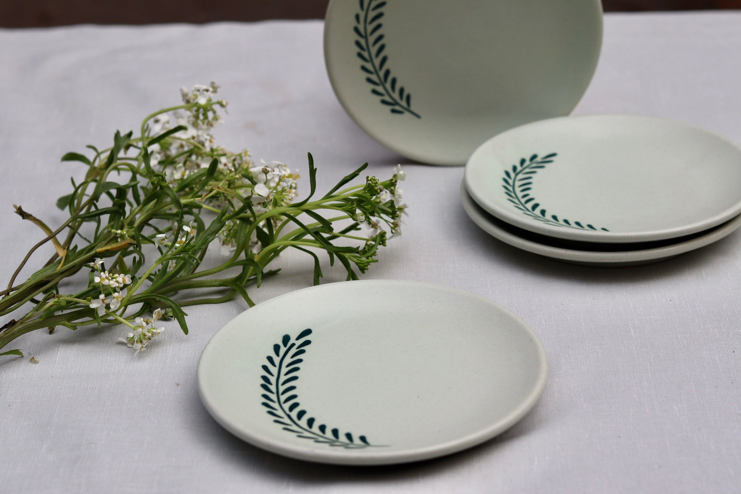 Handmade ceramic dinner plates with flowers