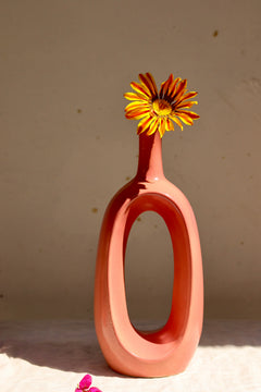 Pink contour vase with flower