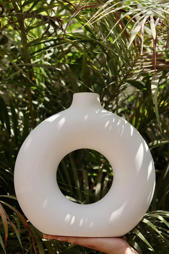 Large donut vase in hand