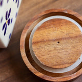 Wooden lid with jar